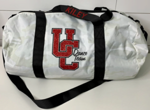 Red Glitter 'UC' on white duffel bag